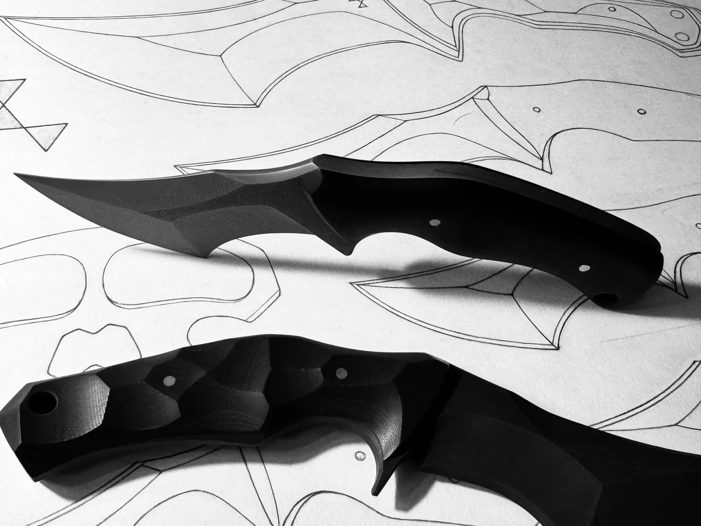 Crusader knives over Jonathan’s original drawings Crusader knives over Jonathan’s original drawings