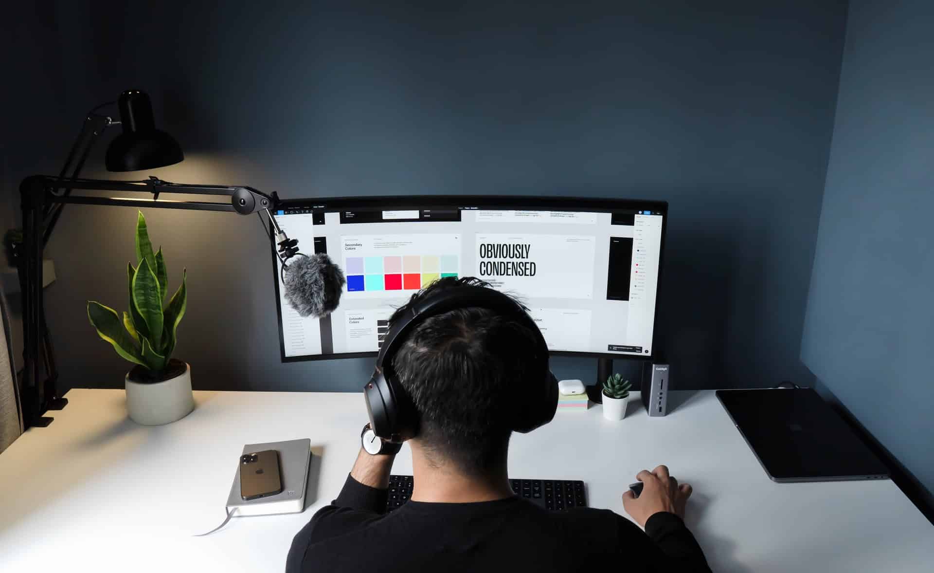 a designer working on a brand strategy design on his computer